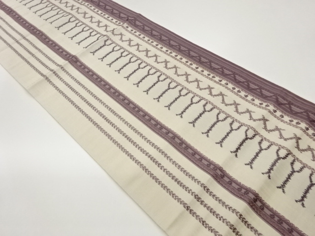 縞に抽象模様織出し名古屋帯